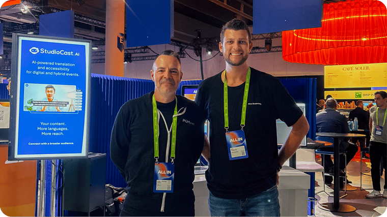 Louis-Philippe Landry and E. Kyle Friedrichs in front of the PQM.net booth at ALL IN 2026.