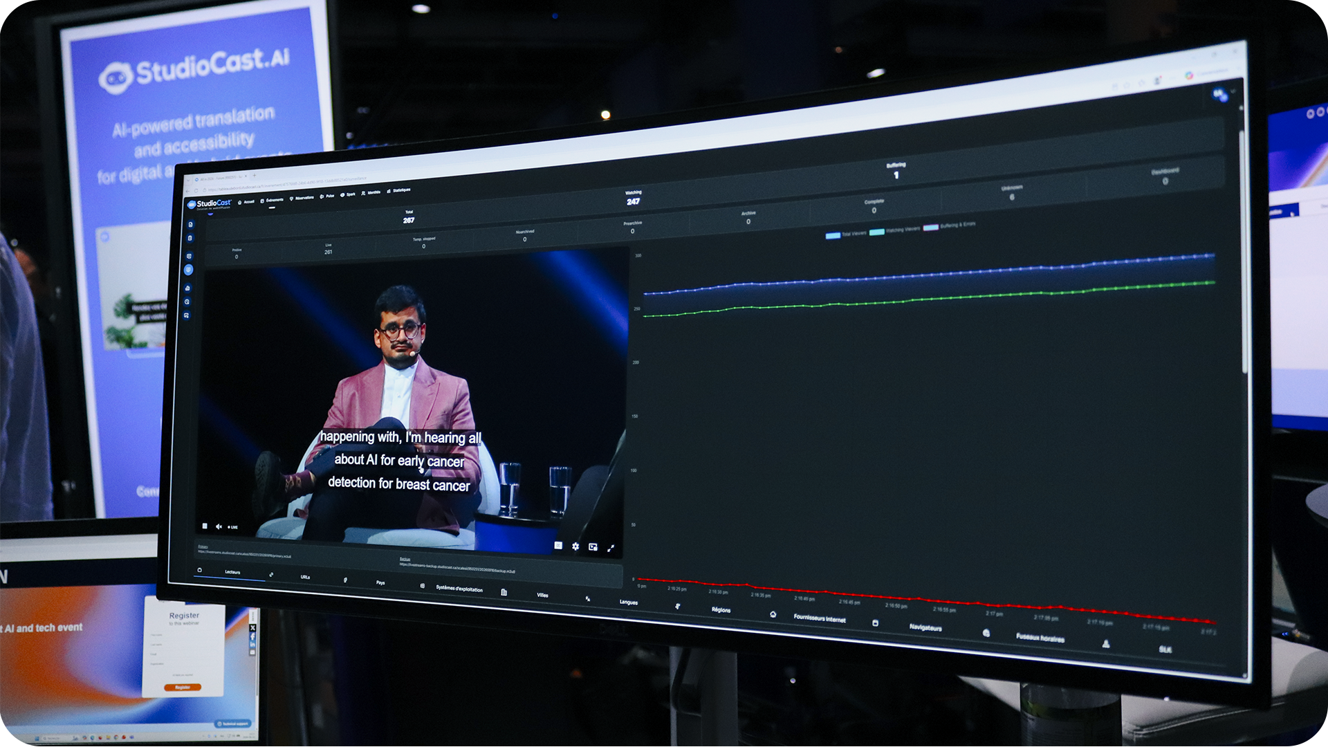 Screen displaying a conference simultaneously translated into English, with real-time subtitles generated by StudioCast.Ai.